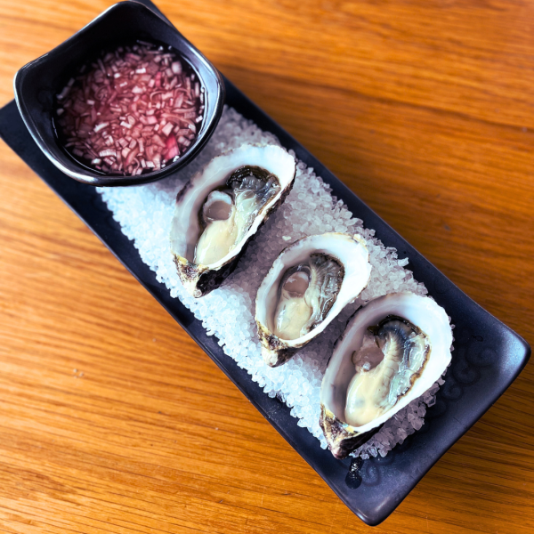 three oysters with mignonette